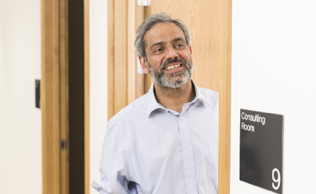Consultant at door