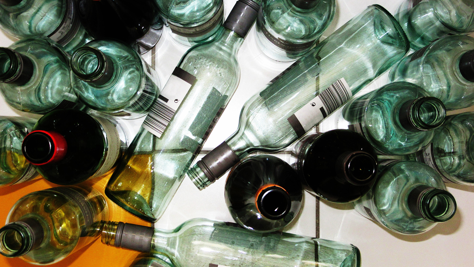 empty wine and beer bottles to illustrate binge drinking