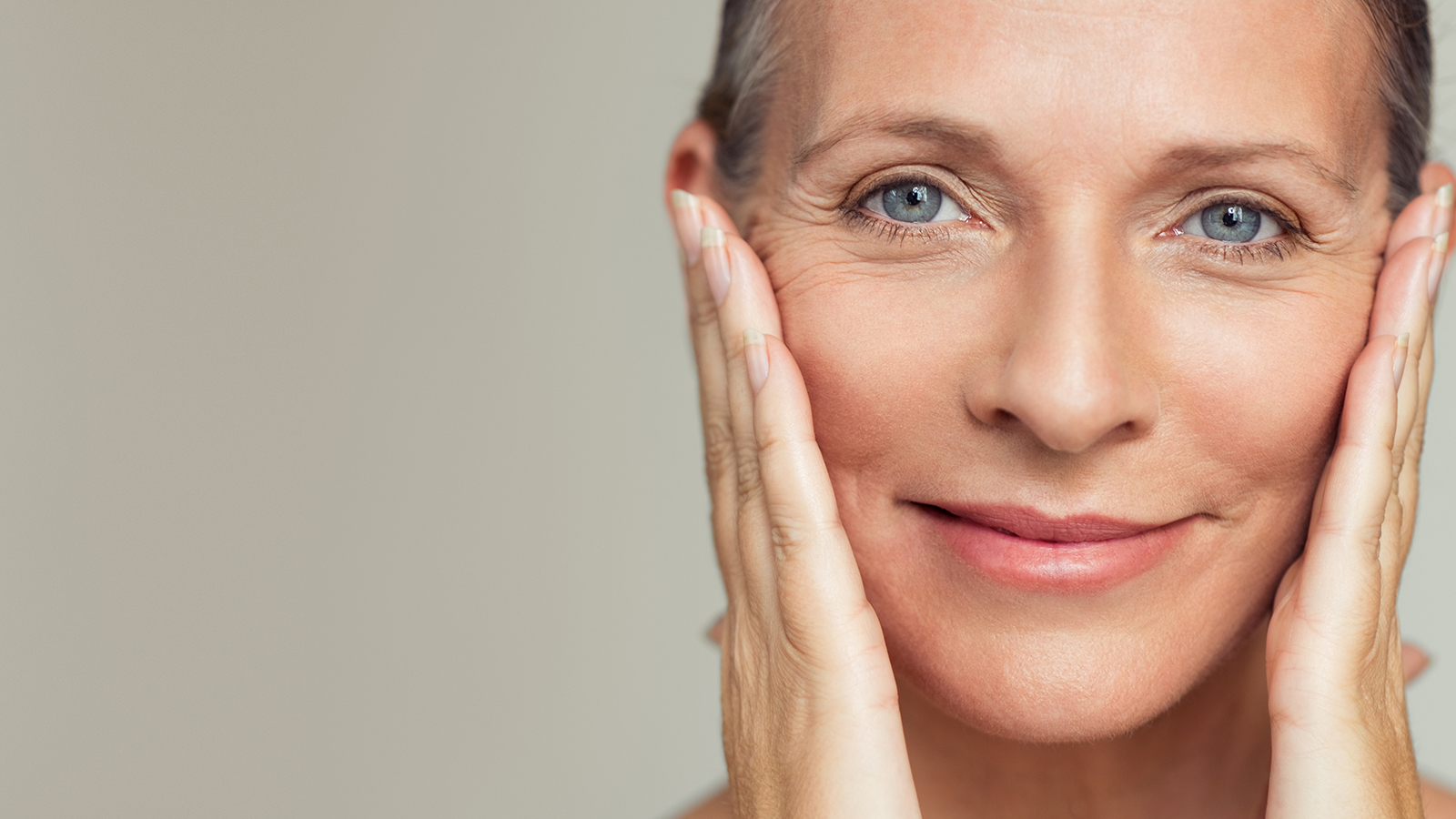 woman looking happy after a facelift