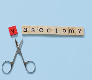 scissors cutting the letter v from the word vasectomy