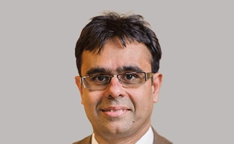 Portrait of Dr Kalpesh Besherdas , Consultant Gastroenterologist & General Physician