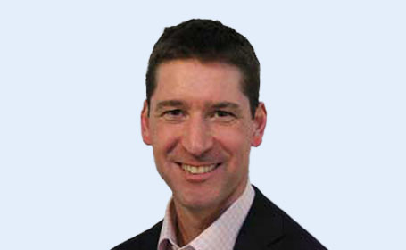 Portrait of Dr Justin Waters , Consultant Medical Oncologist