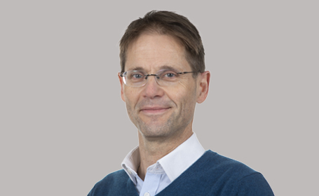 Portrait of Dr Roland M Strauss , Consultant Dermatologist