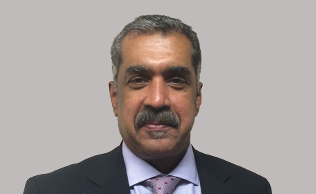 Portrait of Dr Regi George , Consultant Gastroenterologist & Endoscopist