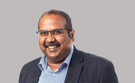Portrait of Dr Sarju Mathew , Consultant Gynaecologist & Obstetrician