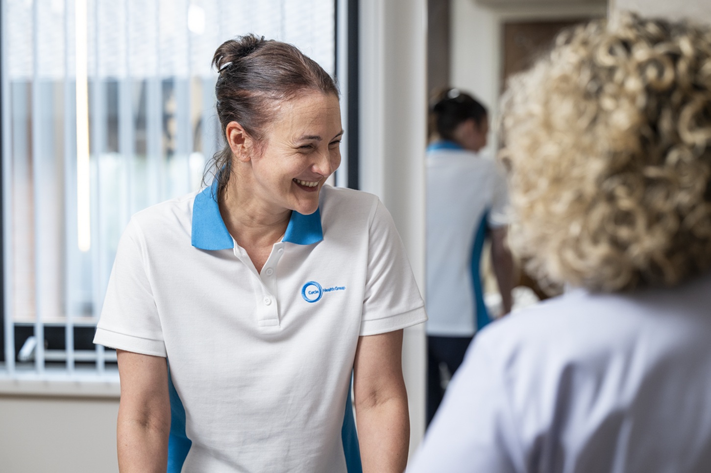 Smiling physiotherapist