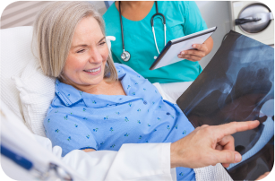 consultant explaining diagnostic scan to patient