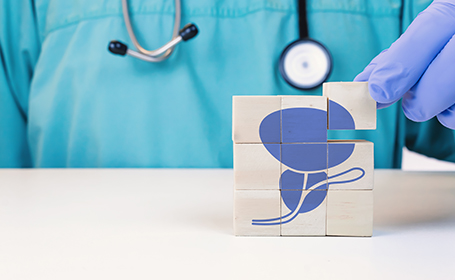 surgeon completing a jigsaw showuing beingn prostate enlargement