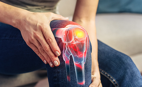 joint pain matters person clutching knee in pain