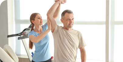 patient stretching with the help of a specialist