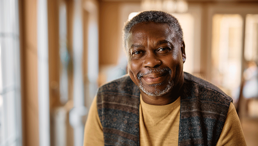 old man smiling to camera