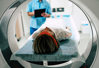 Female patient having an MRI scan