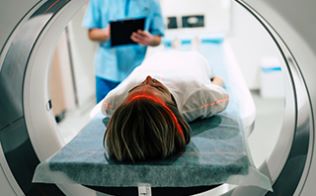 Female patient having an MRI scan