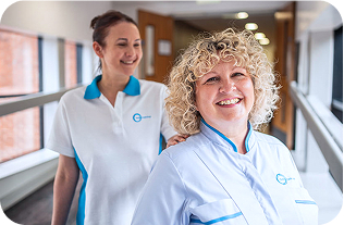 private hospital members of staff smiling