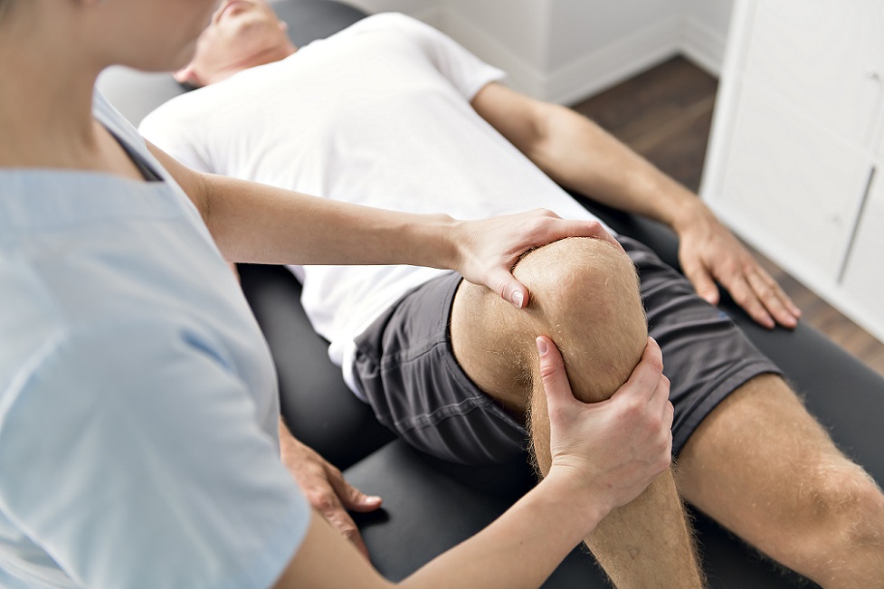 patient being treated by physiotherapist