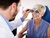 Woman smiles during eye examination