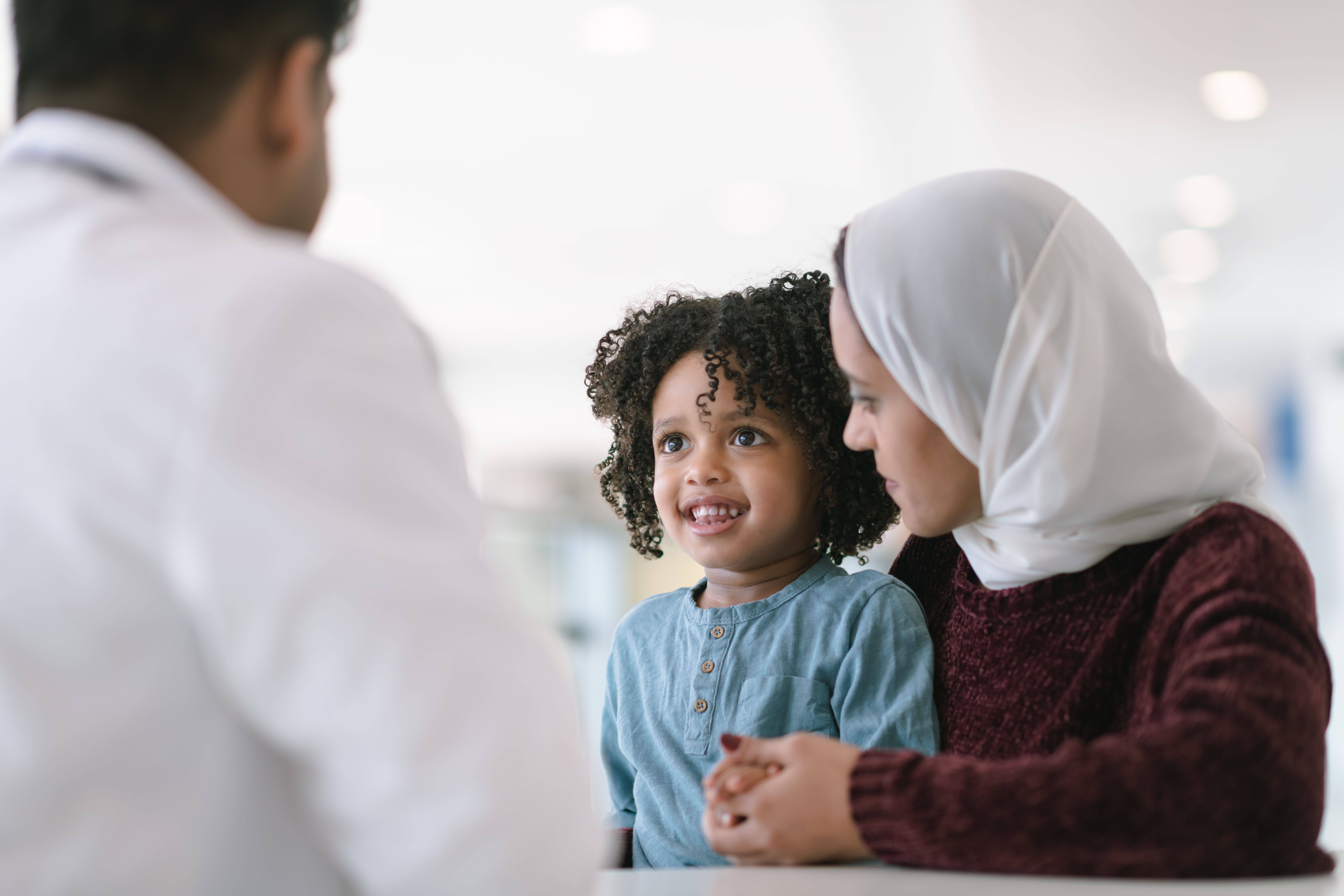 Young patient and her mother in a paediatric orthopaedics consultation