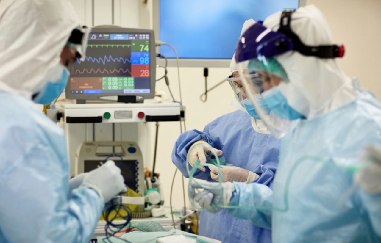 Surgical team performing a carotid endarterectomy procedure