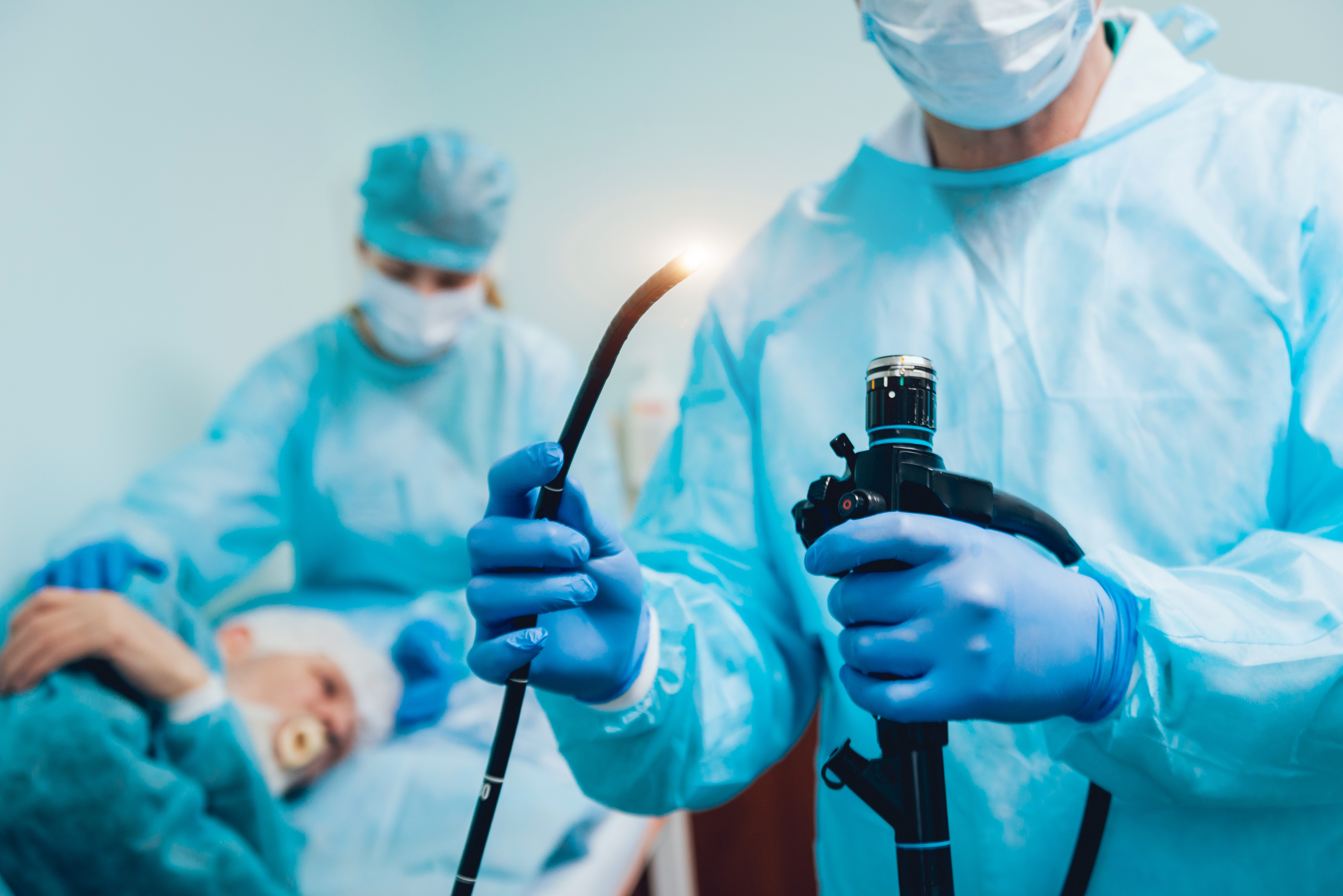 Doctor holding bronchoscope before bronchoscopy