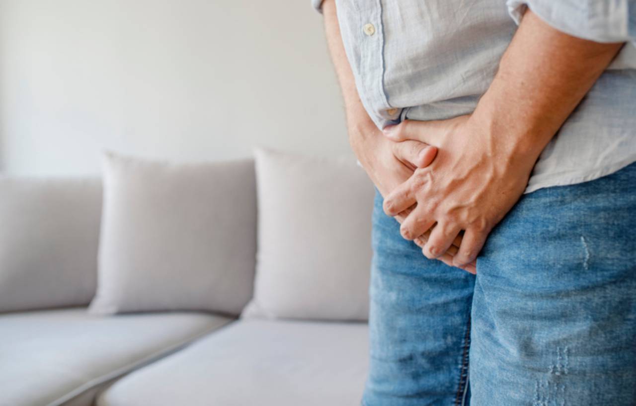 Male suffering with pain caused by a hydrocele