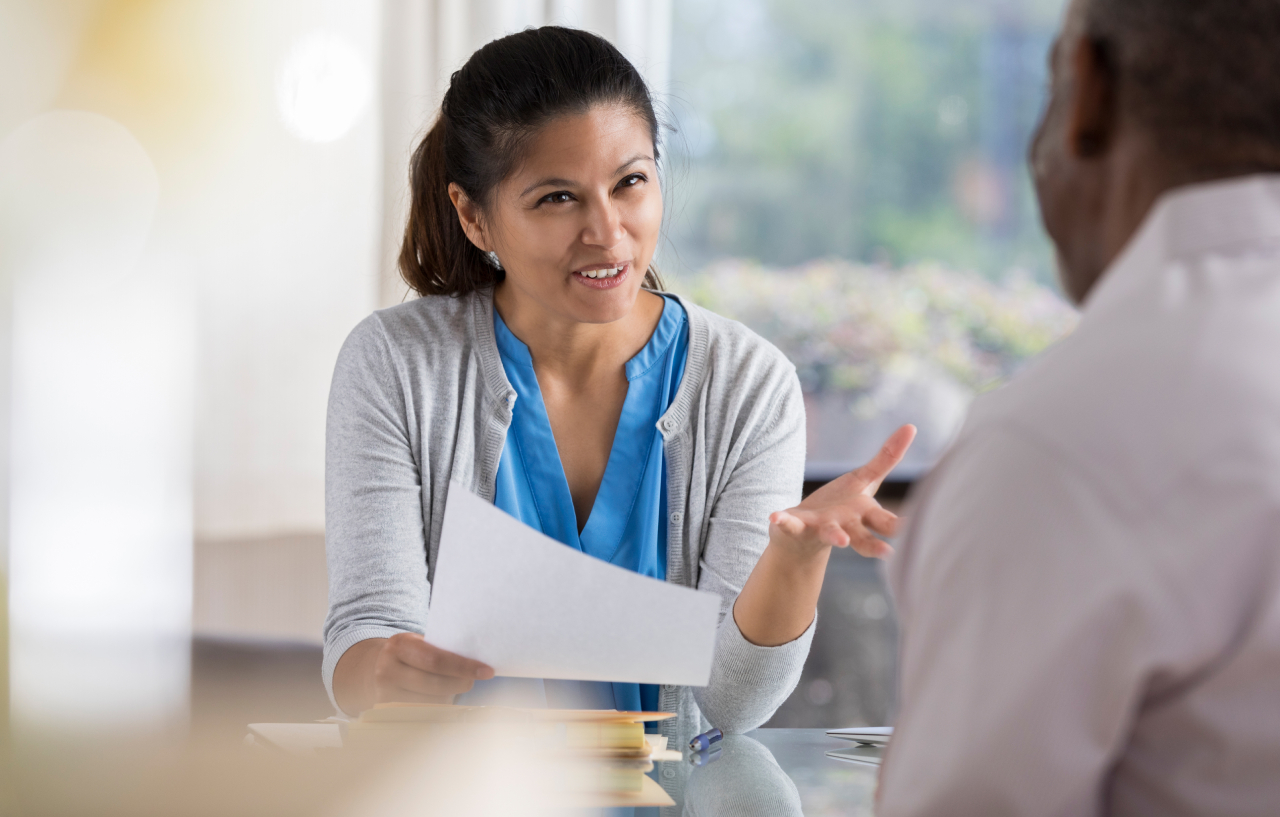 female doctor discussing with new patient