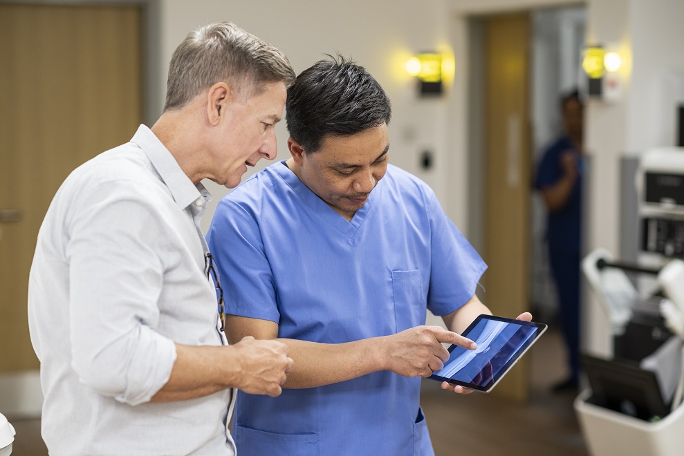 consultant reviewing scan