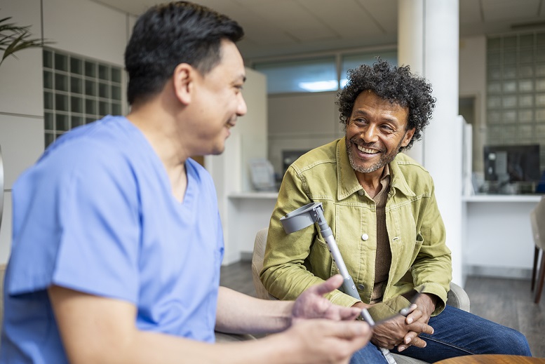 private hospital staff talking to patient