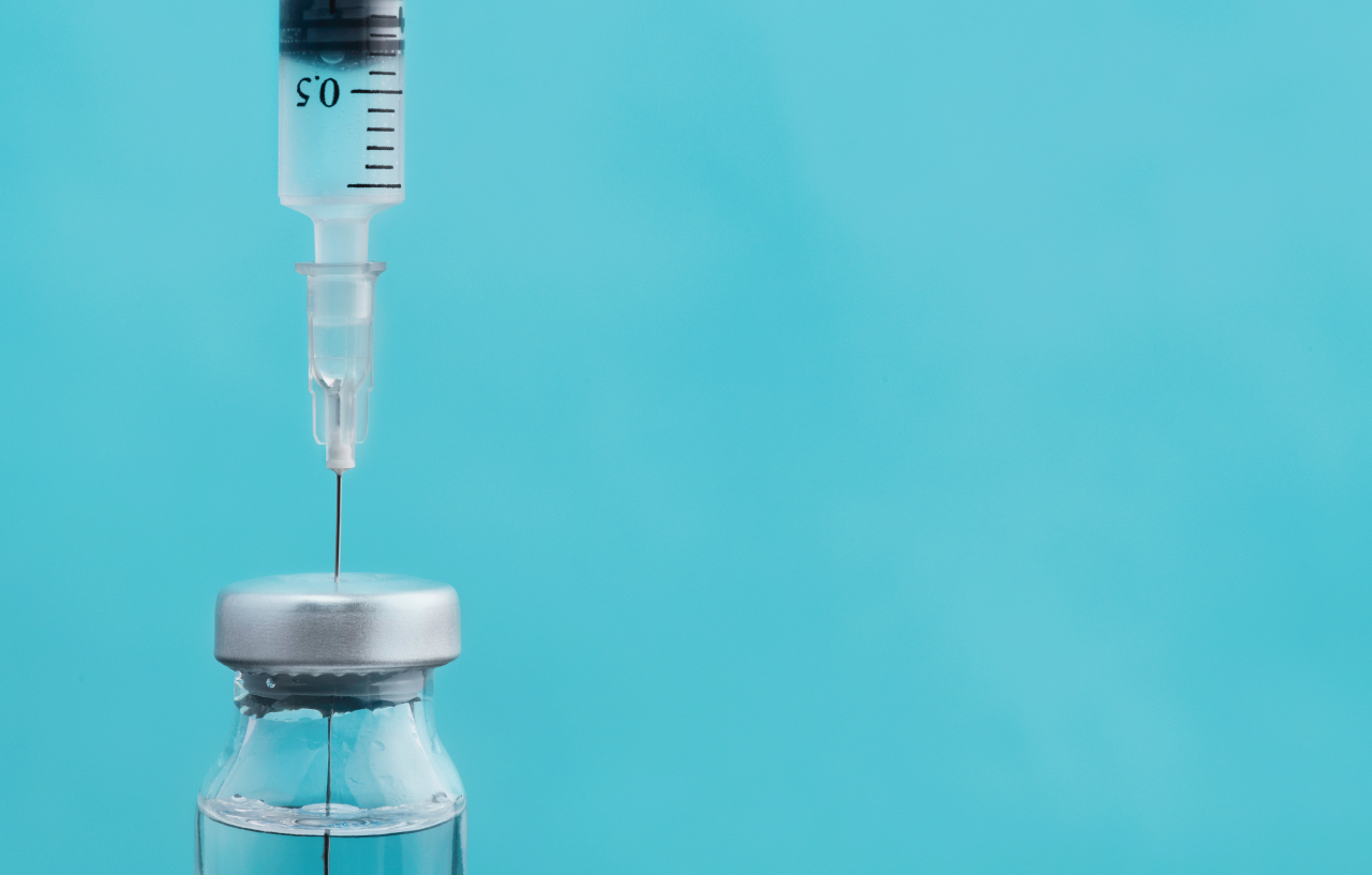 Syringe and vial of medication used for hepatitis C treatment